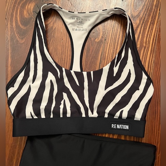 P.E. NATION Rematch Zebra Sports Bra and Workout Leggings SET REVOLVE Yoga - Picture 7 of 10